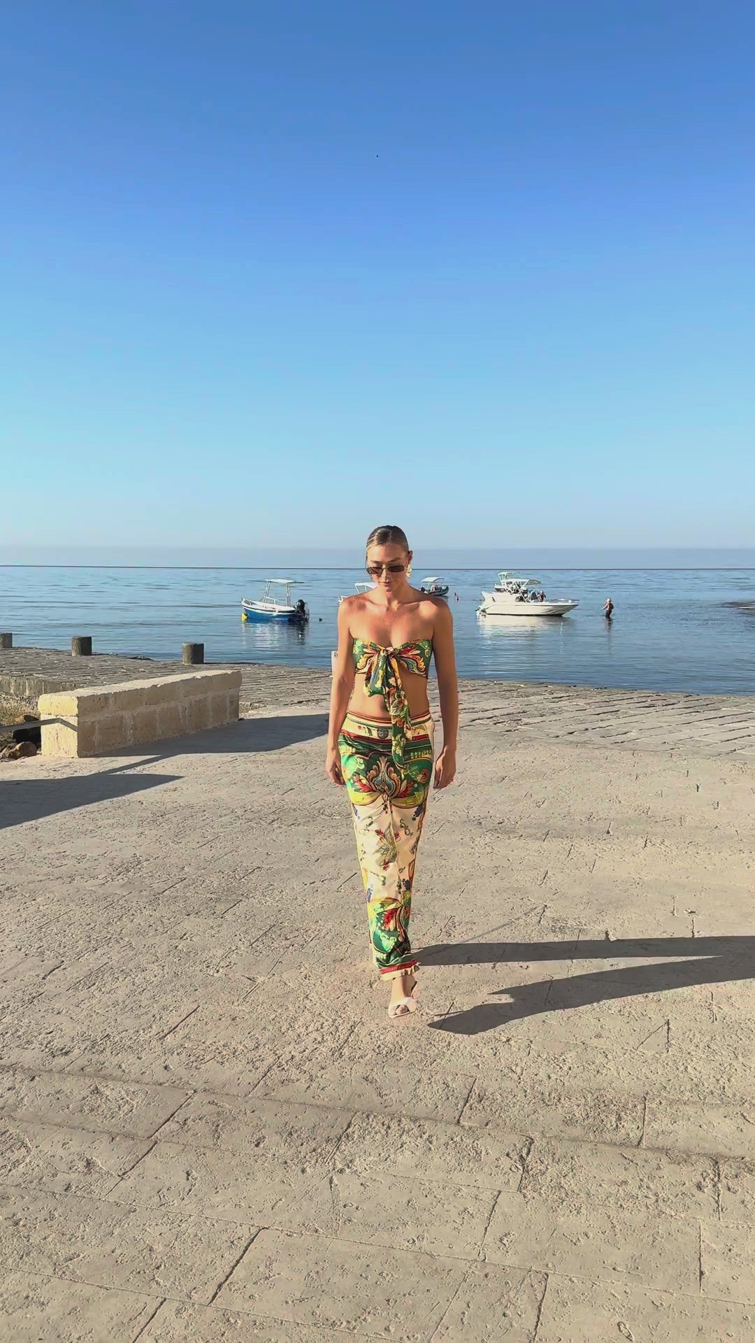 Dolce Vita women's satin set video, walking along the seafront promenade, We Hustle