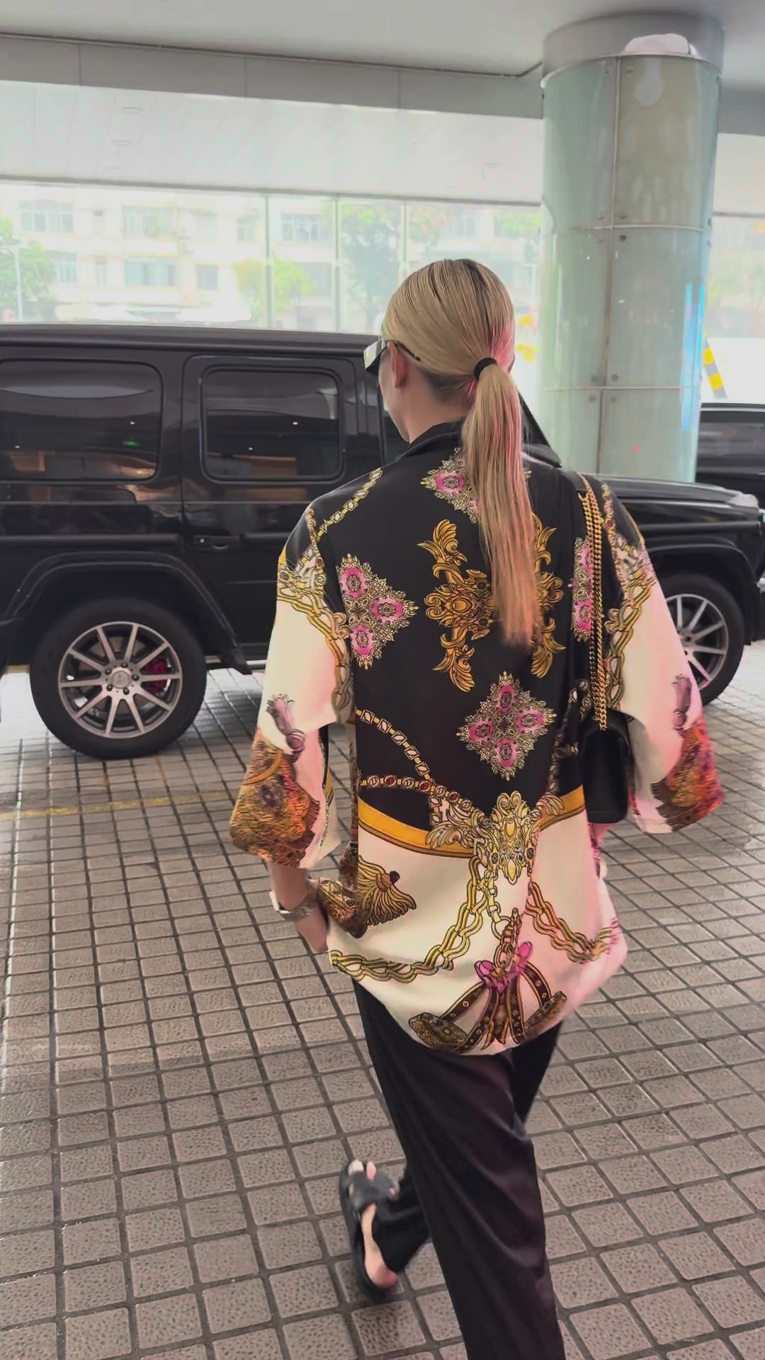 Monaco women's satin shirt video, back view of the print styled with trousers, We Hustle